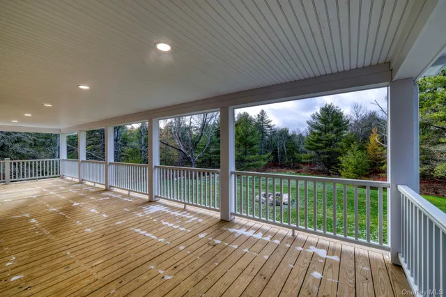 a view of a house with a large window