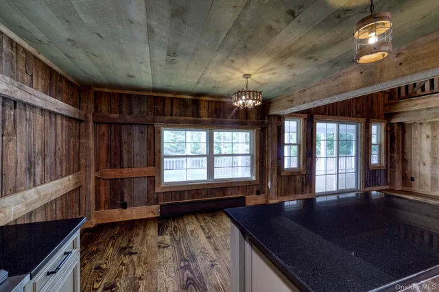 a kitchen with a sink and a refrigerator