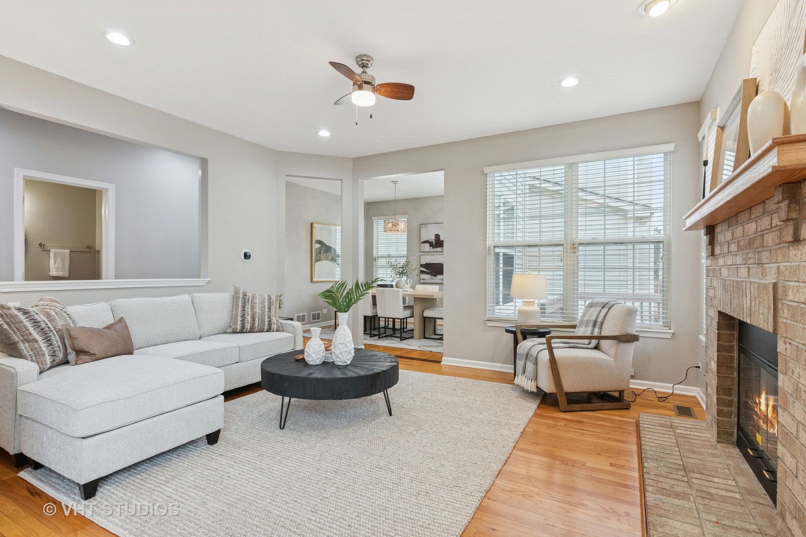 5178 Scott Circle Lisle, IL 60532 - Photo 12 of 45 a living room with furniture and a fireplace