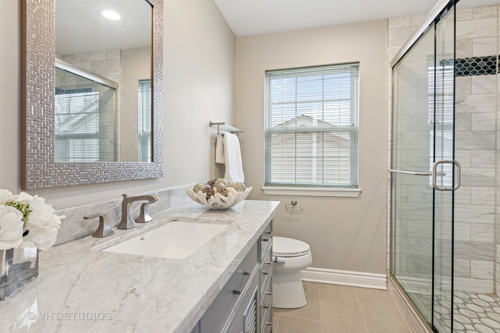5178 Scott Circle Lisle, IL 60532 - Photo 31 of 45 a bathroom with a sink toilet and shower