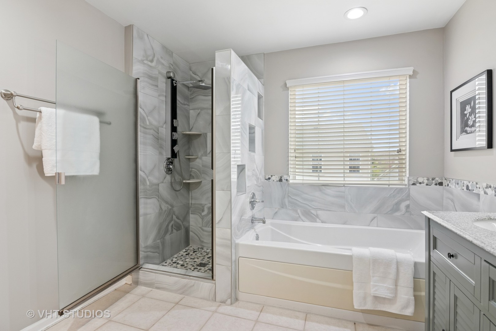 5178 Scott Circle Lisle, IL 60532 - Photo 39 of 45 a bathroom with a granite countertop bathtub shower and sink