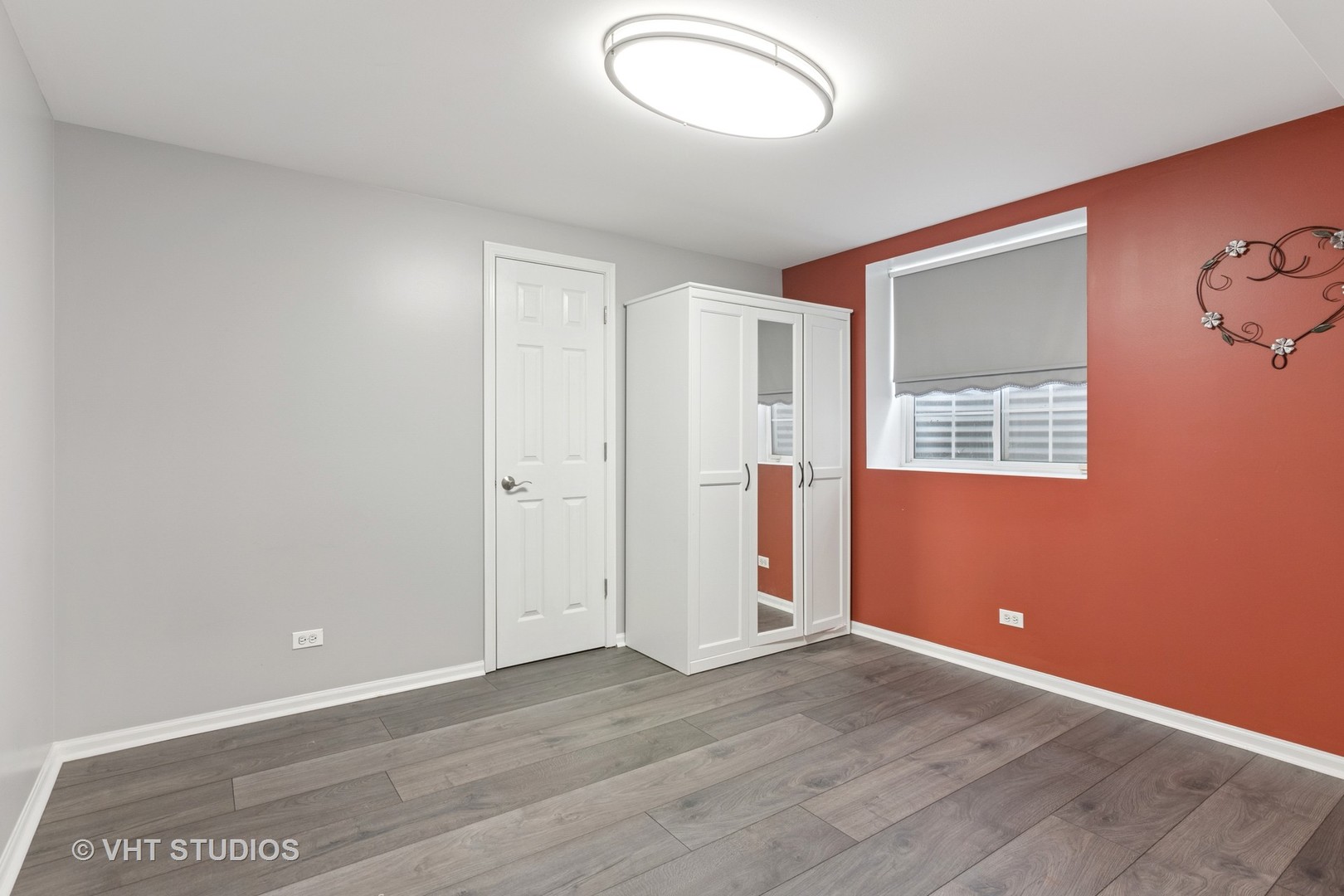 5178 Scott Circle Lisle, IL 60532 - Photo 41 of 45 an empty room with wooden floor and windows