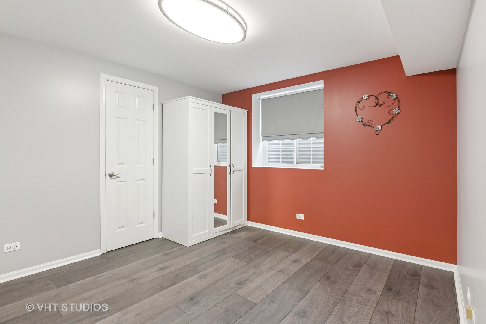 5178 Scott Circle Lisle, IL 60532 - Photo 42 of 45 an empty room with wooden floor and windows