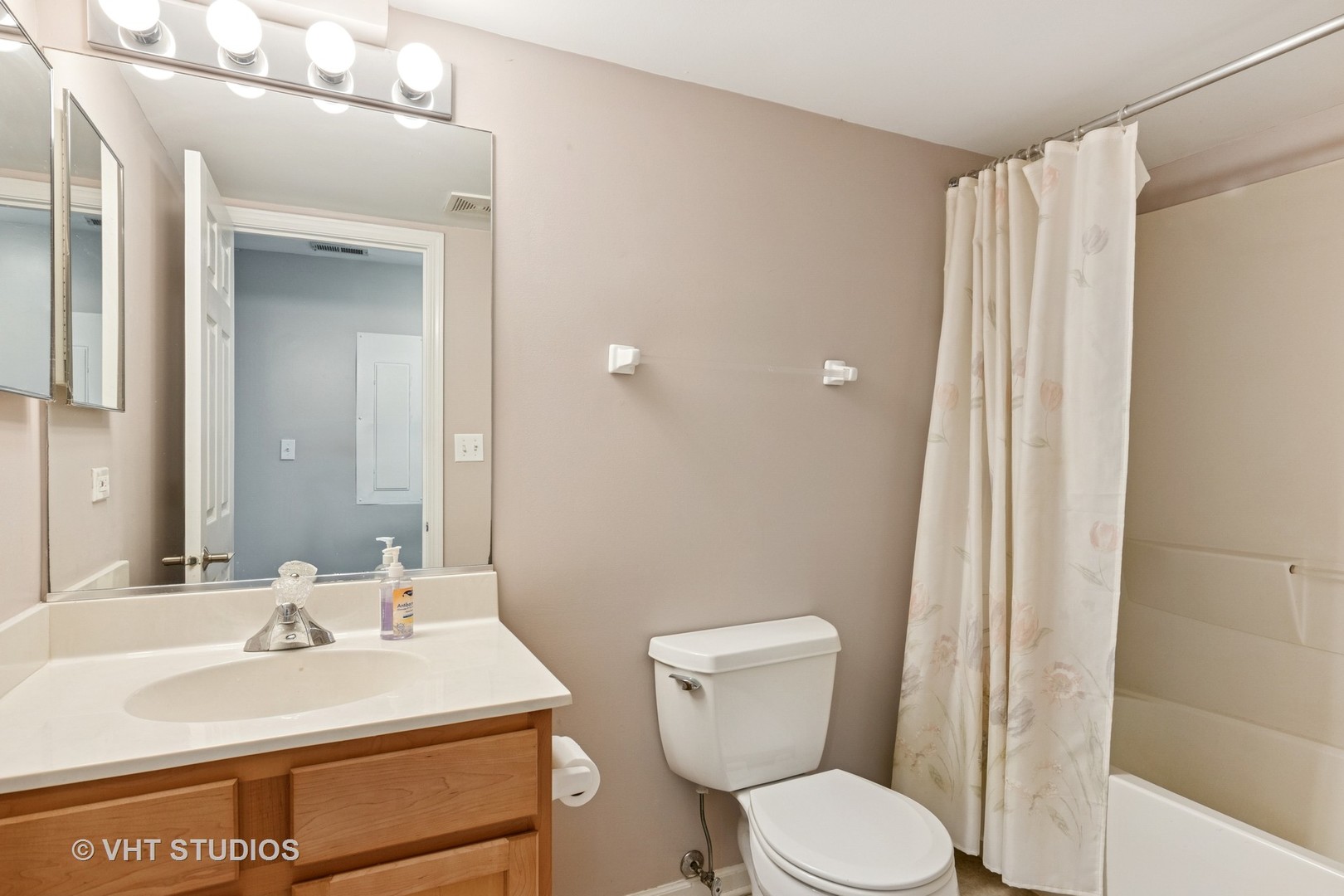 5178 Scott Circle Lisle, IL 60532 - Photo 45 of 45 a bathroom with a sink a toilet and shower