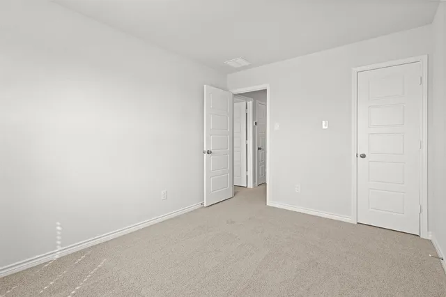 a view of a backyard with a garden