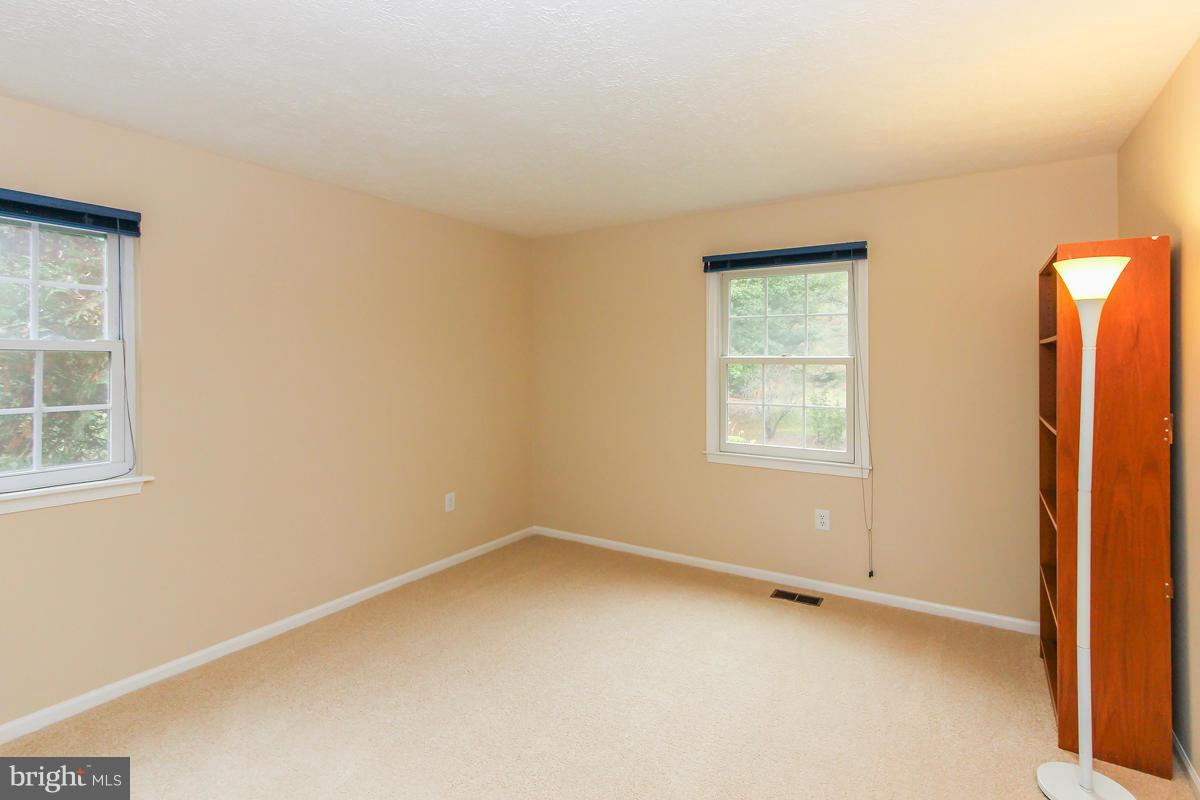1861 Post Oak Trail Reston, VA 20191 - Photo 22 of 30 an empty room with a window