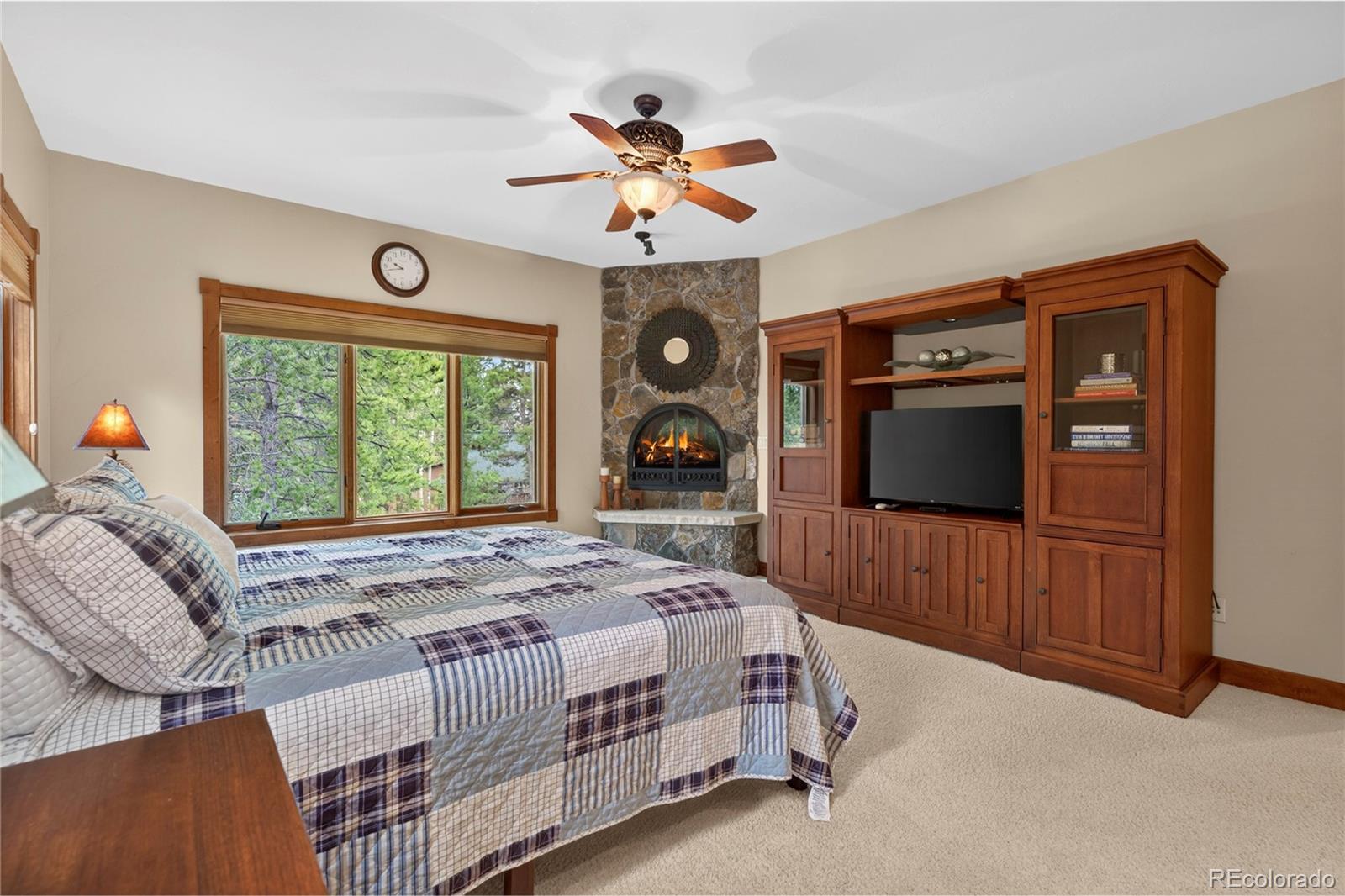 148 County Road Tabernash, CO 80478 - Photo 23 of 45 a bedroom with a bed and a large window