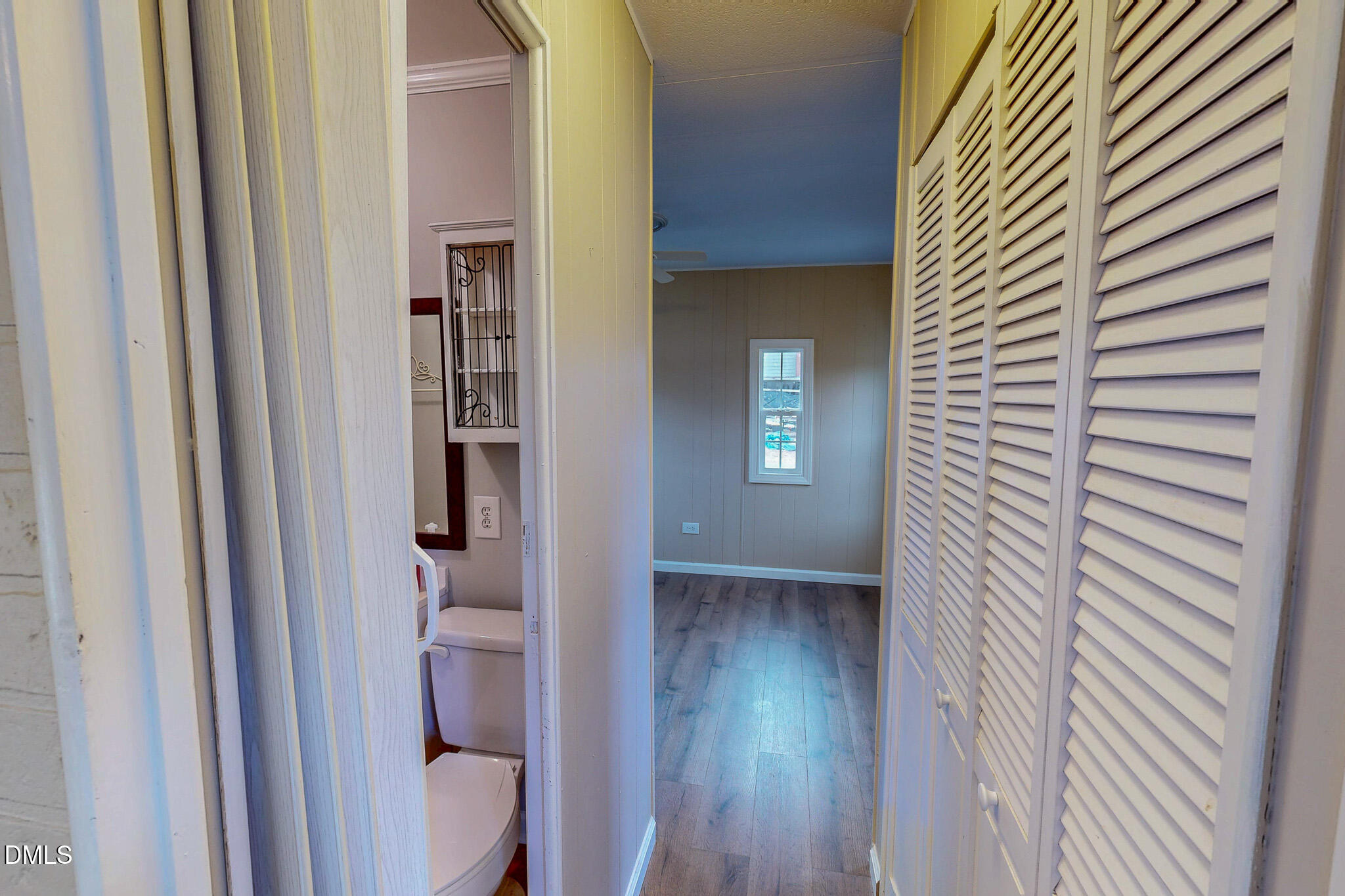 410 Berea Road Rougemont, NC 27572 - Photo 14 of 18 a view of a hallway with wooden floor and staircase