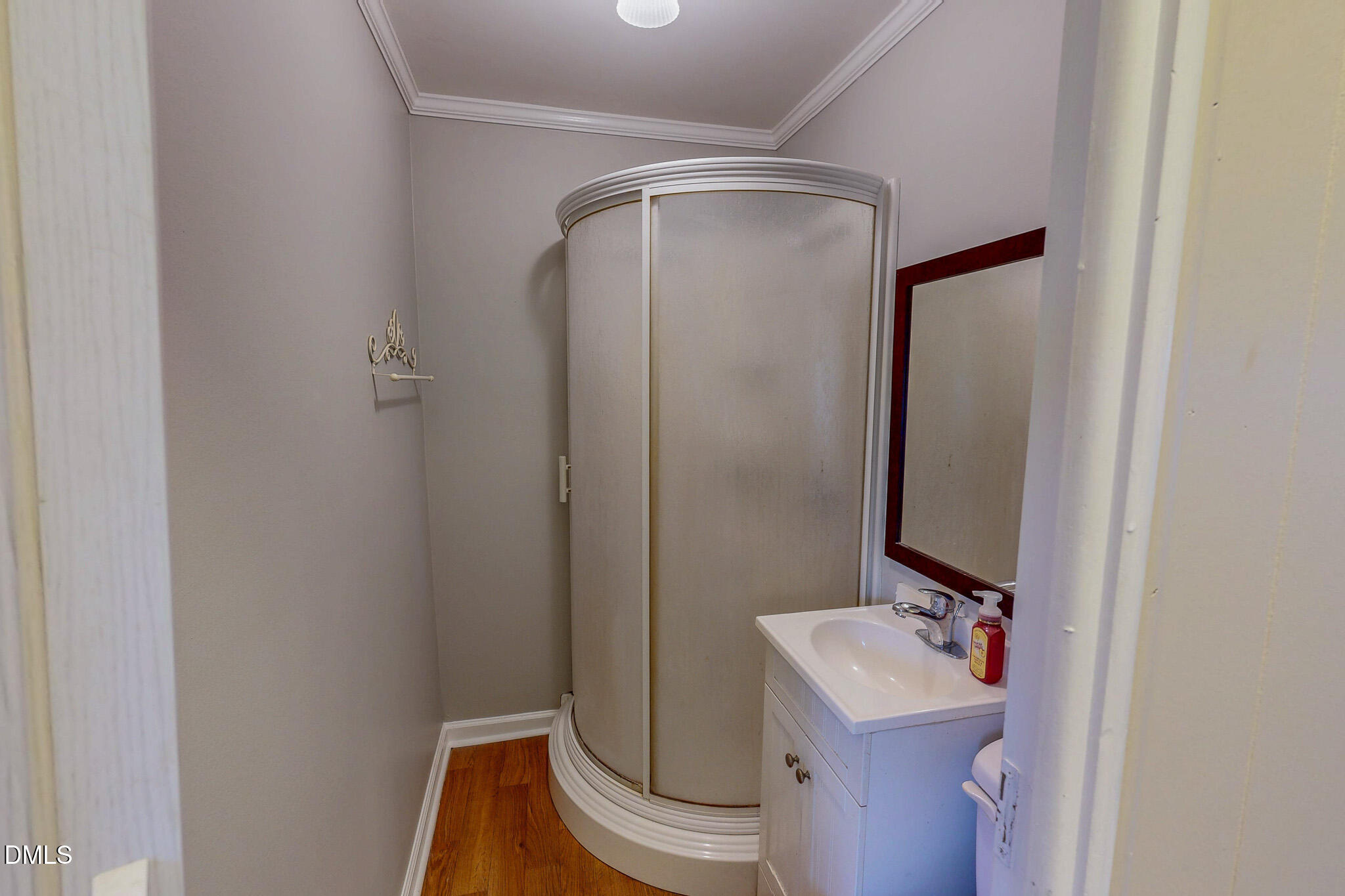 410 Berea Road Rougemont, NC 27572 - Photo 15 of 18 a bathroom with a sink a toilet and mirror