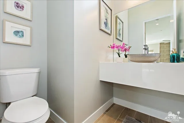 a bathroom with a sink and a toilet