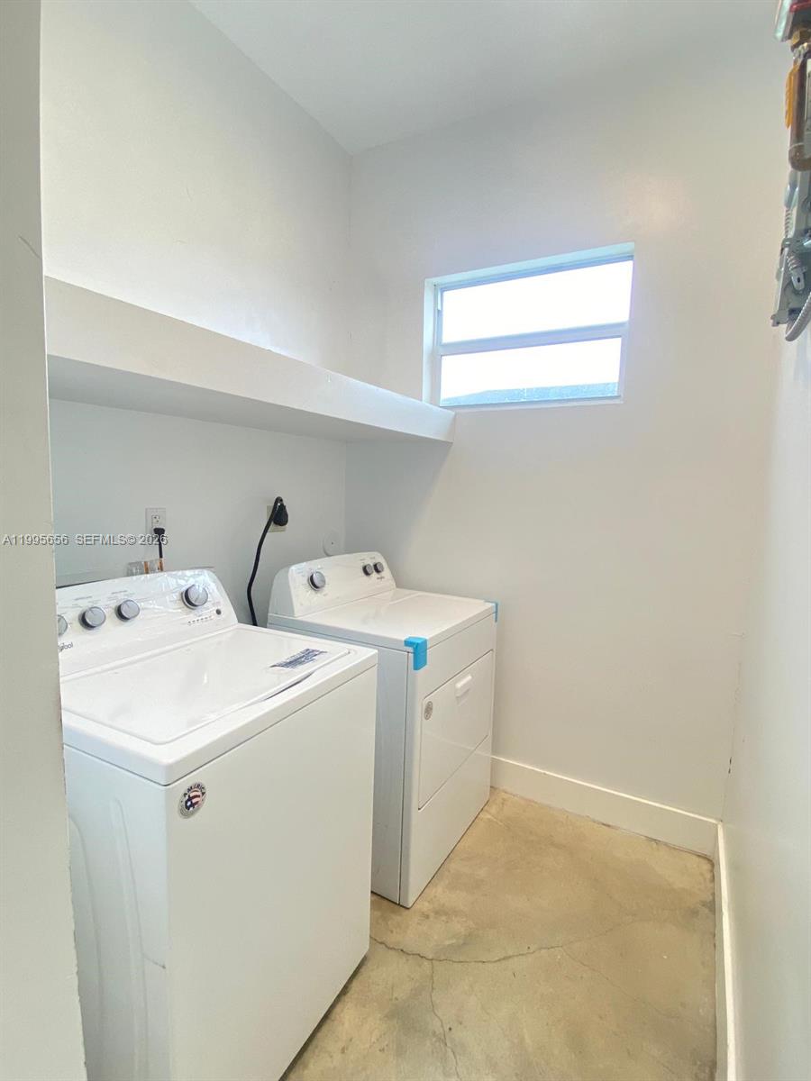 12150 Southwest 213th Street, Unit 12150 Miami, FL 33177 - Photo 12 of 16 a utility room with dryer and washer