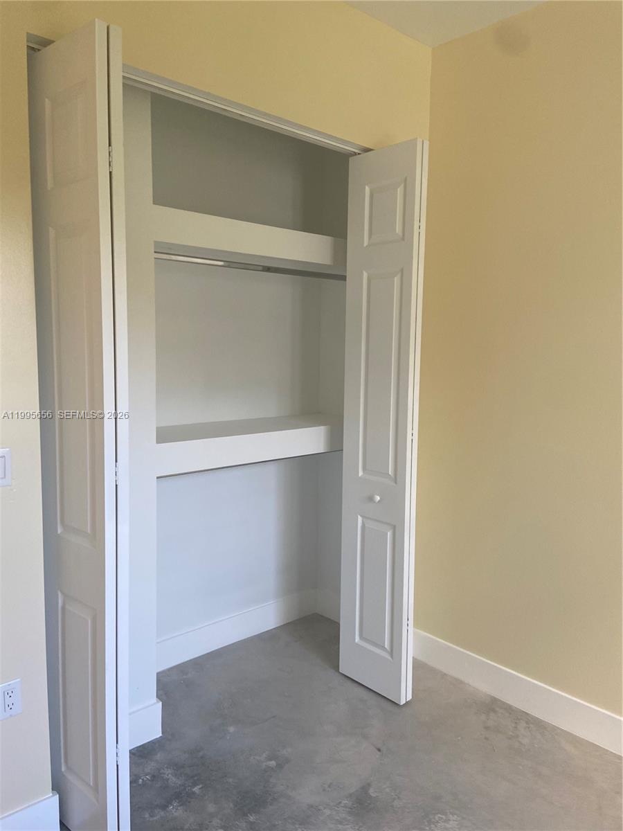 12150 Southwest 213th Street, Unit 12150 Miami, FL 33177 - Photo 13 of 16 a view of an empty room