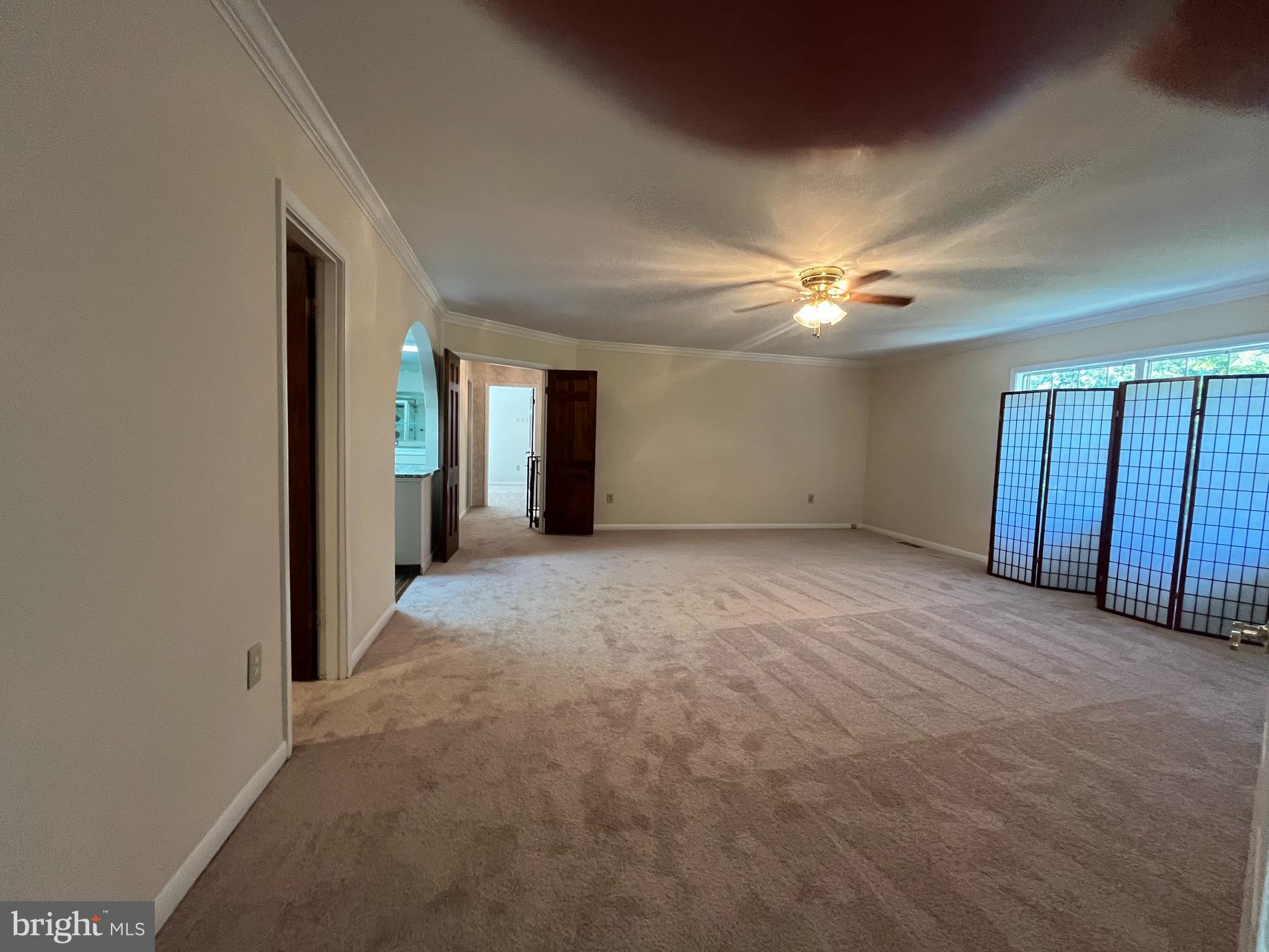 3203 Riverview Drive Triangle, VA 22172 - Photo 25 of 78 a view of an empty room with a ceiling fan