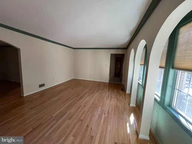 a view of livingroom with furniture and wooden floor