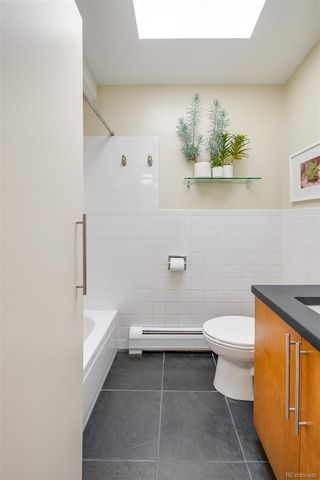 a bathroom with a toilet and a sink