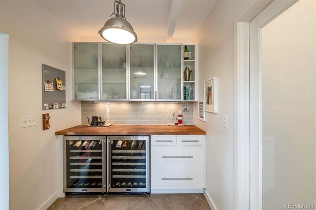 a kitchen with a stove and a cabinet