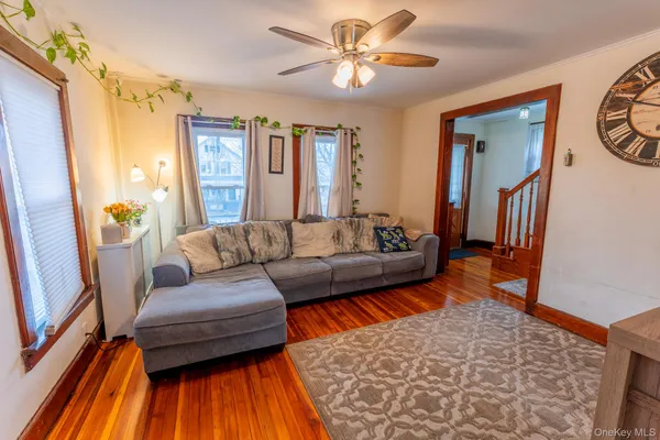 a living room with furniture and a rug