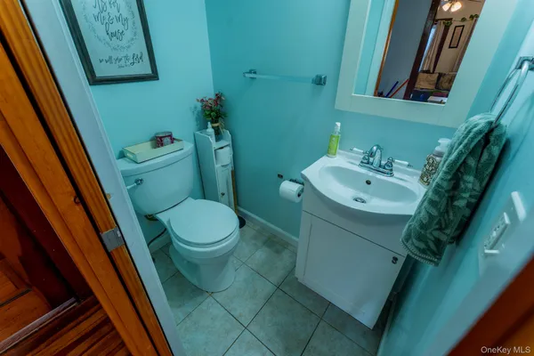 a bathroom with a sink and toilet