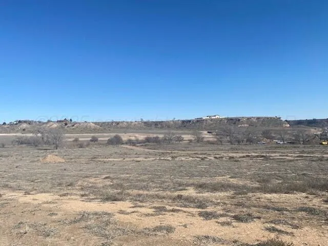 a view of beach and a yard