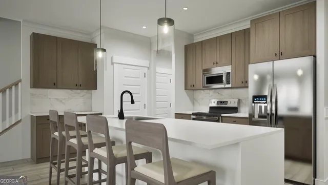 a kitchen with stainless steel appliances a table chairs refrigerator and microwave