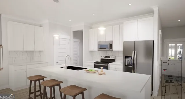 a kitchen with stainless steel appliances a refrigerator a stove a sink a dining table and chairs