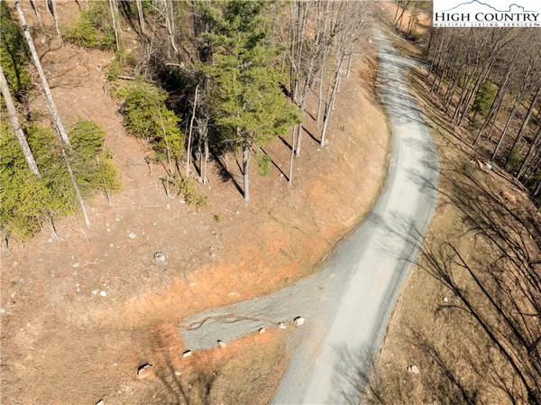 a view of swimming pool with a yard
