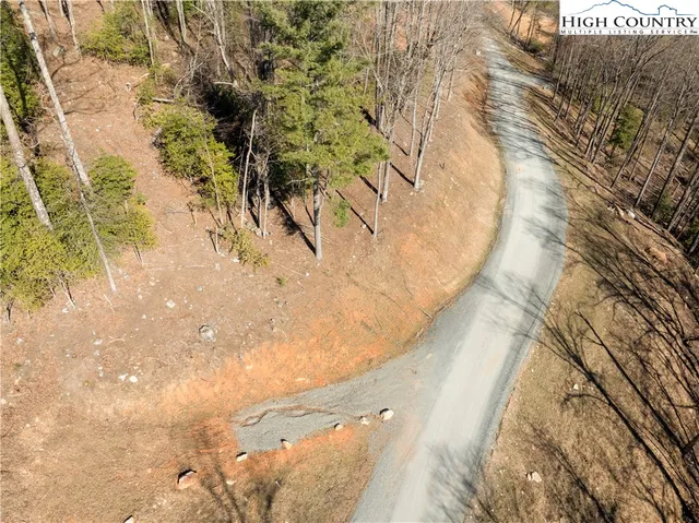 a view of swimming pool with a yard