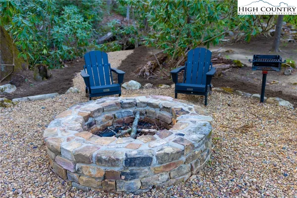 a backyard of a house with seating space