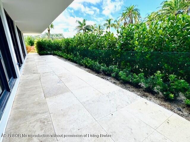 2580 South Ocean Boulevard, Unit 1A1 Palm Beach, FL 33480 - Photo 16 of 24 a view of a backyard of the house