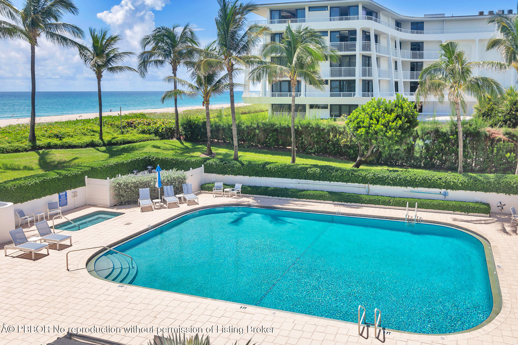 2580 South Ocean Boulevard, Unit 1A1 Palm Beach, FL 33480 - Photo 17 of 24 a view of a house with a backyard and swimming pool