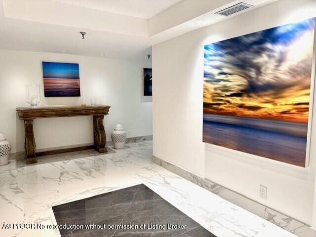 2580 South Ocean Boulevard, Unit 1A1 Palm Beach, FL 33480 - Photo 2 of 24 a view of an empty room and window