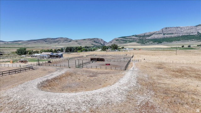 1634 West Arimo Road Arimo, ID 83214 - Photo 74 of 89 Expansive property featuring a large fenced paddock, additional fenced areas, and a visible outbuilding