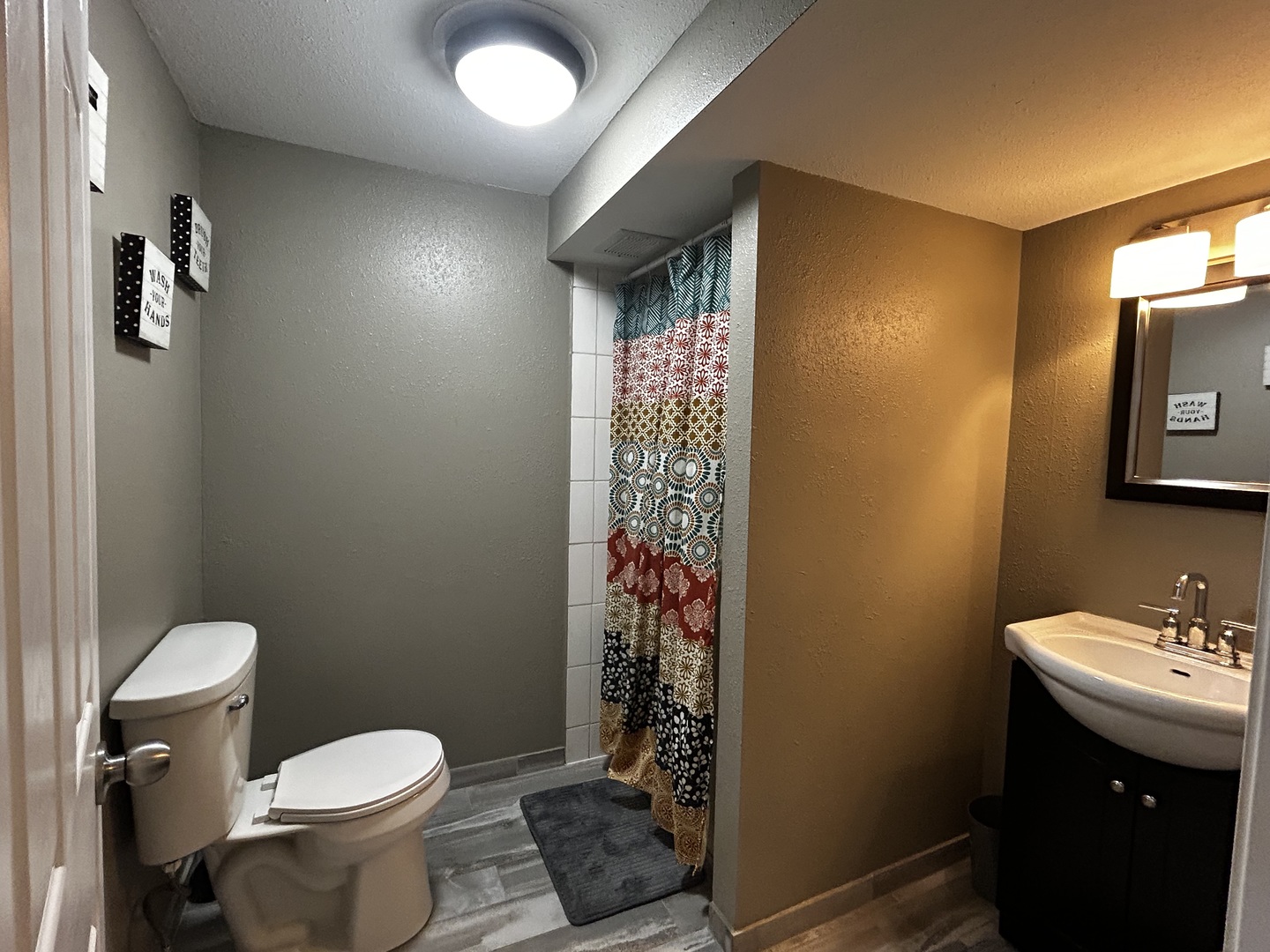 12795 Lawrence Road Sterling, IL 61081 - Photo 35 of 42 a bathroom with a sink toilet and shower