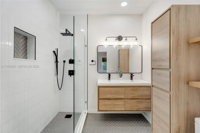 a bathroom with a sink and a mirror