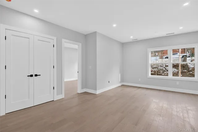 a view of a glass door and a window