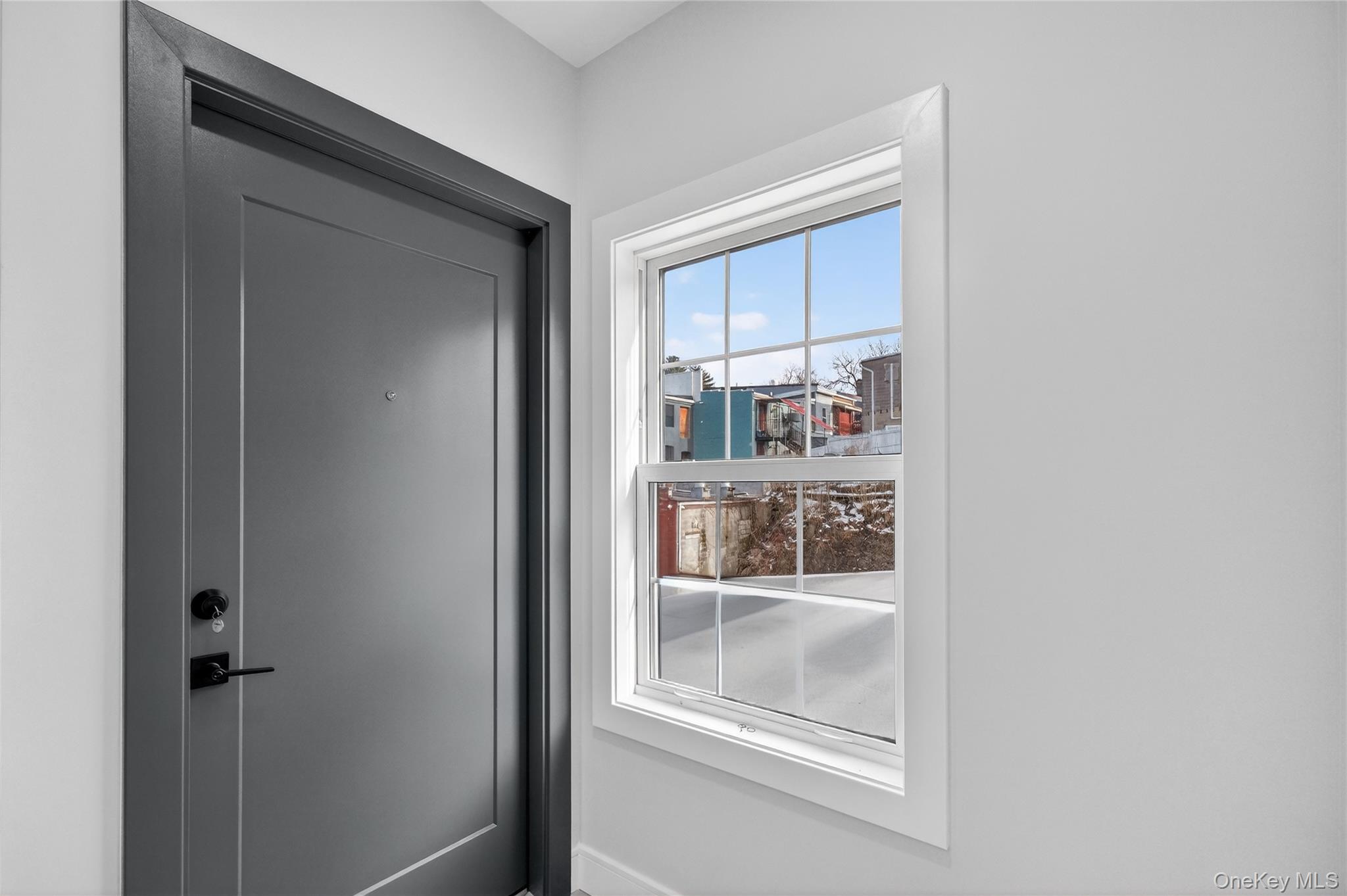 10 Market Street, Unit F Wappingers Falls, NY 12590 - Photo 13 of 14 a view of a glass door and a window