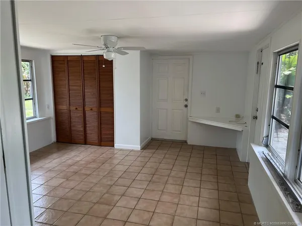 an empty room with closet