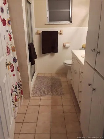 a bathroom with a sink and toilet