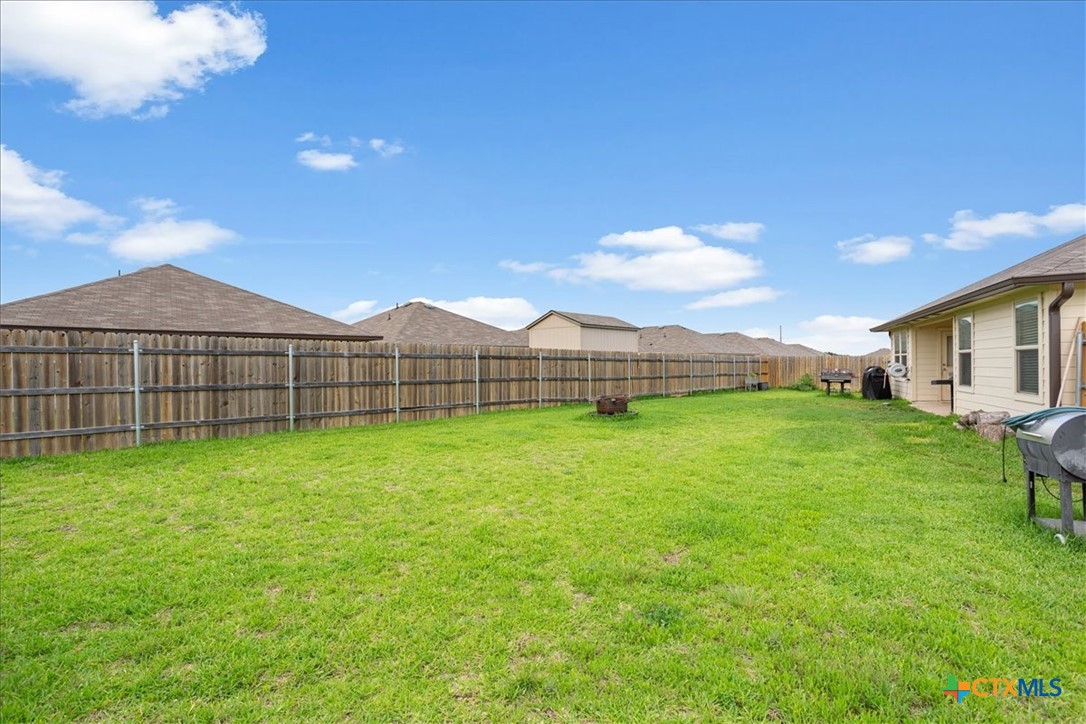 1000 Velvet Court Troy, TX 76579 - Photo 24 of 25 a view of an house with backyard space and balcony