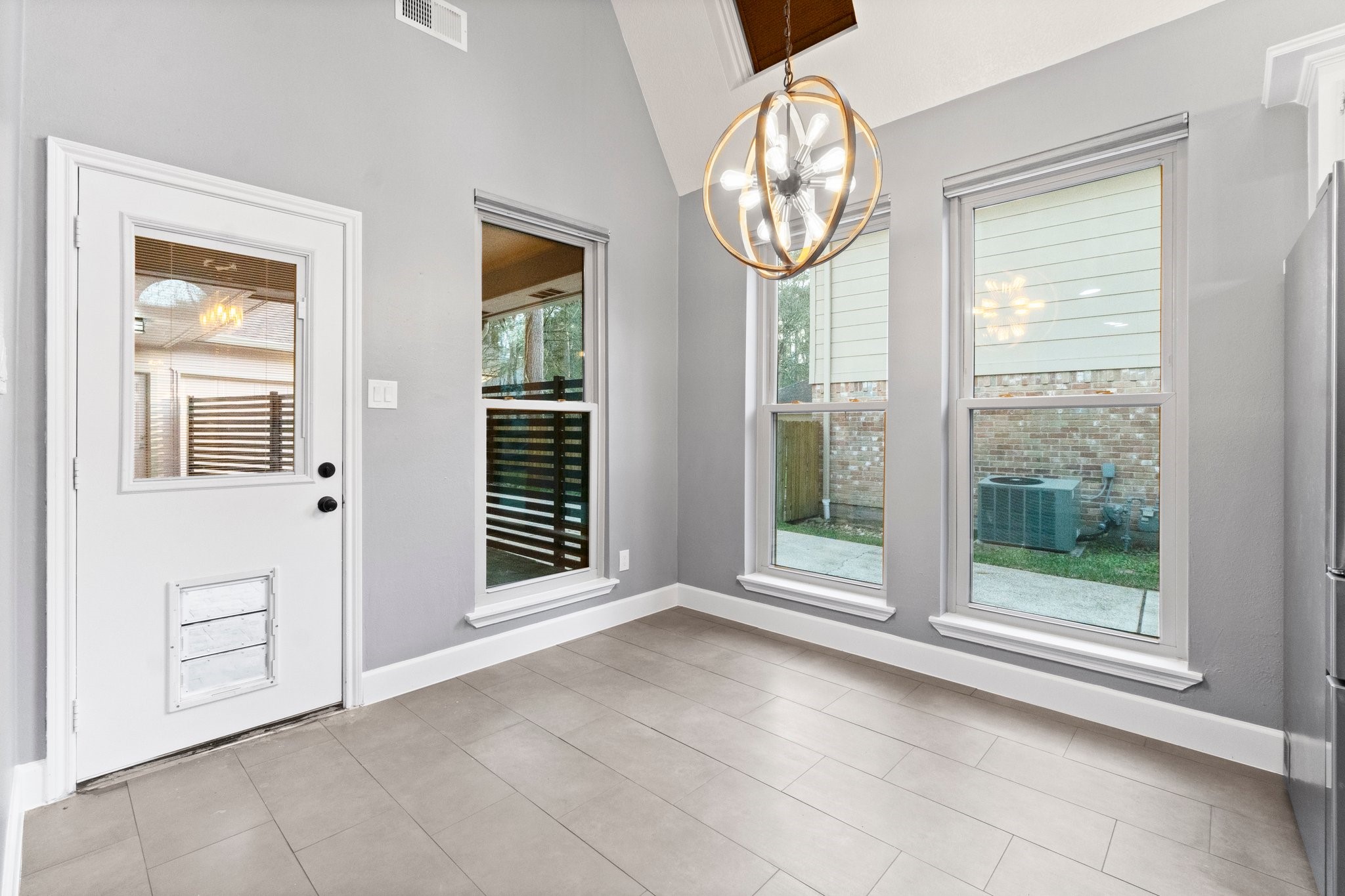 31 Tanager Trail The Woodlands, TX 77381 - Photo 15 of 48 a view of an empty room with a window