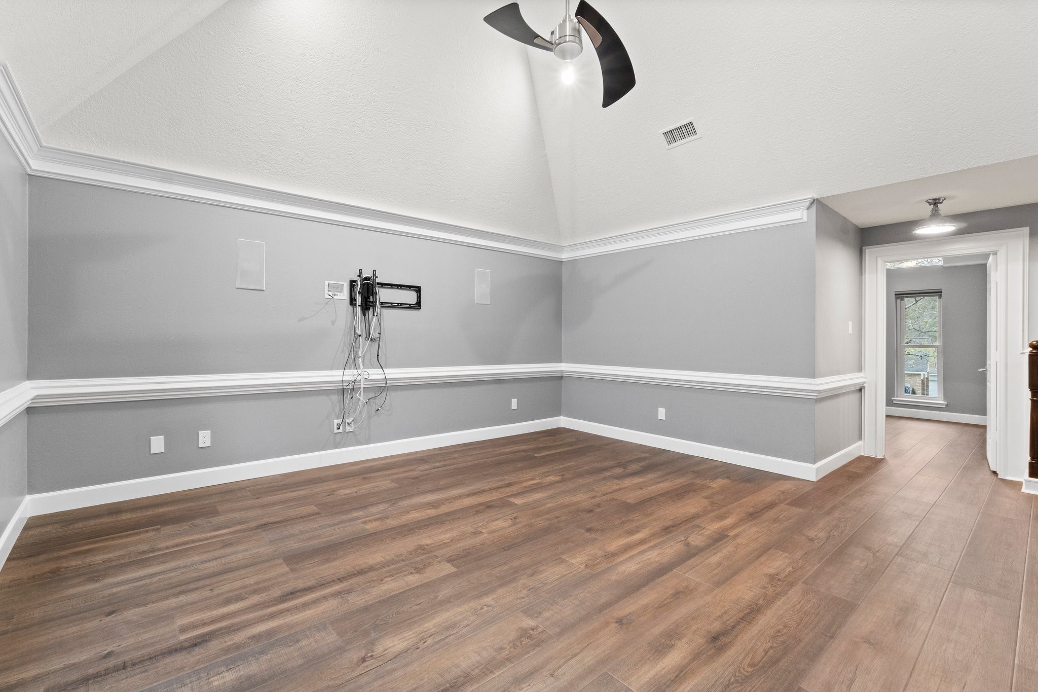 31 Tanager Trail The Woodlands, TX 77381 - Photo 19 of 48 a view of a livingroom with wooden floor