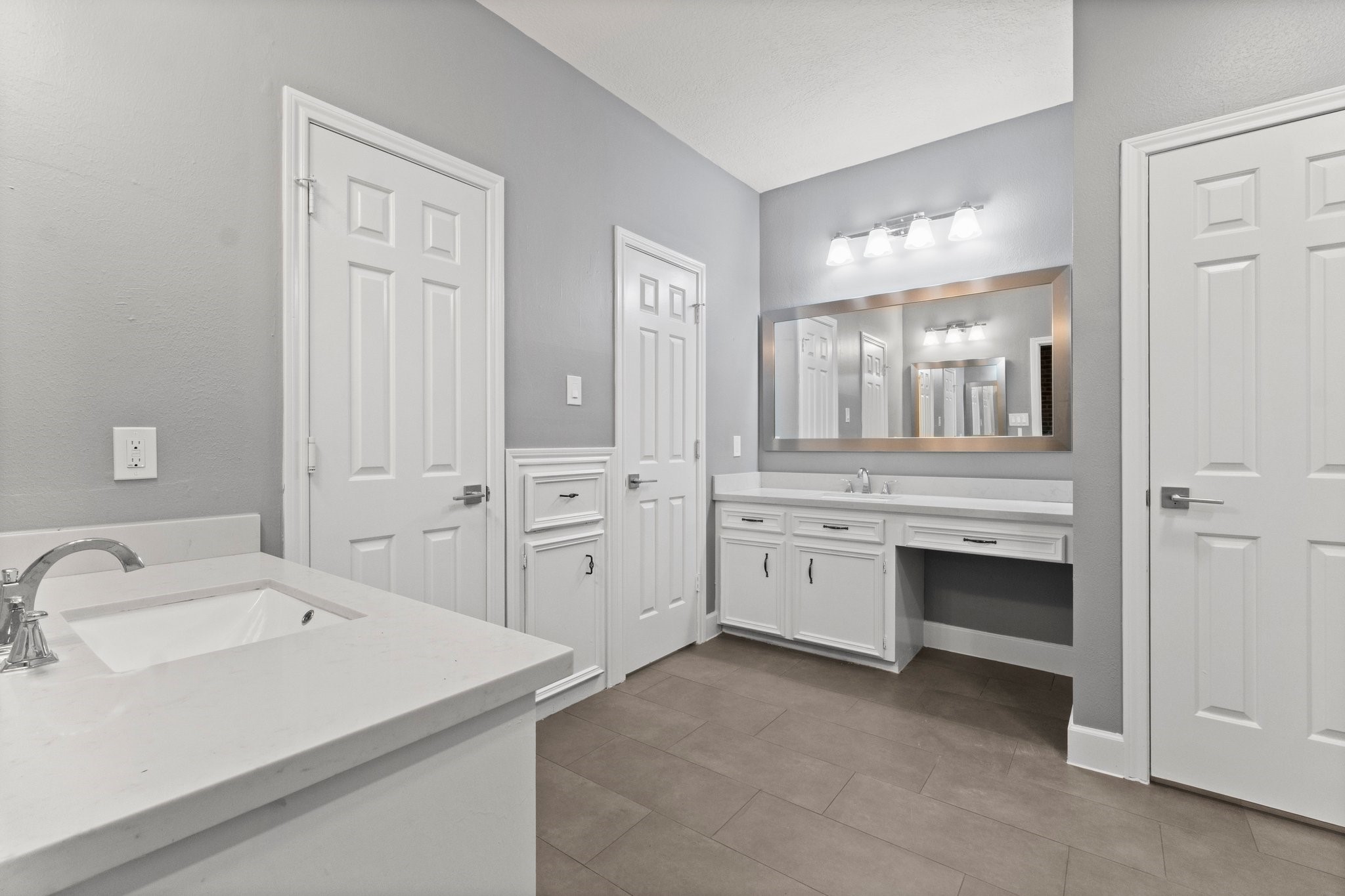 31 Tanager Trail The Woodlands, TX 77381 - Photo 24 of 48 a bathroom with a sink and a mirror
