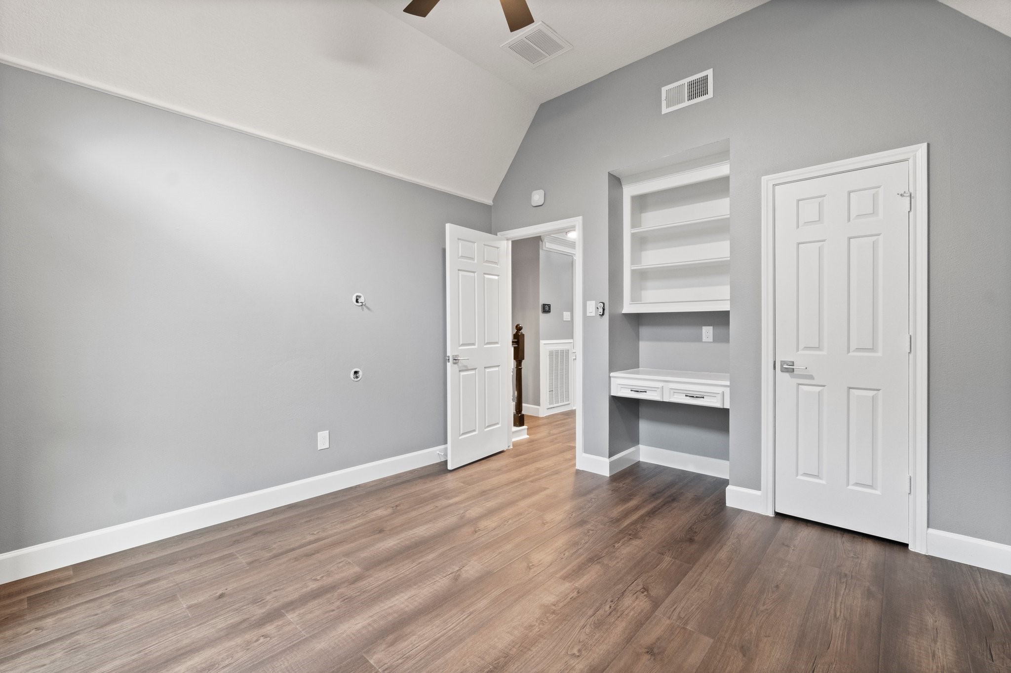 31 Tanager Trail The Woodlands, TX 77381 - Photo 26 of 48 a view of a kitchen with wooden floor and a sink