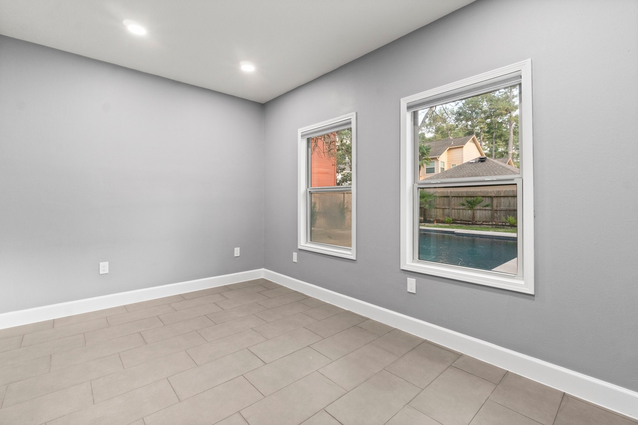 31 Tanager Trail The Woodlands, TX 77381 - Photo 27 of 48 a view of an empty room with a window