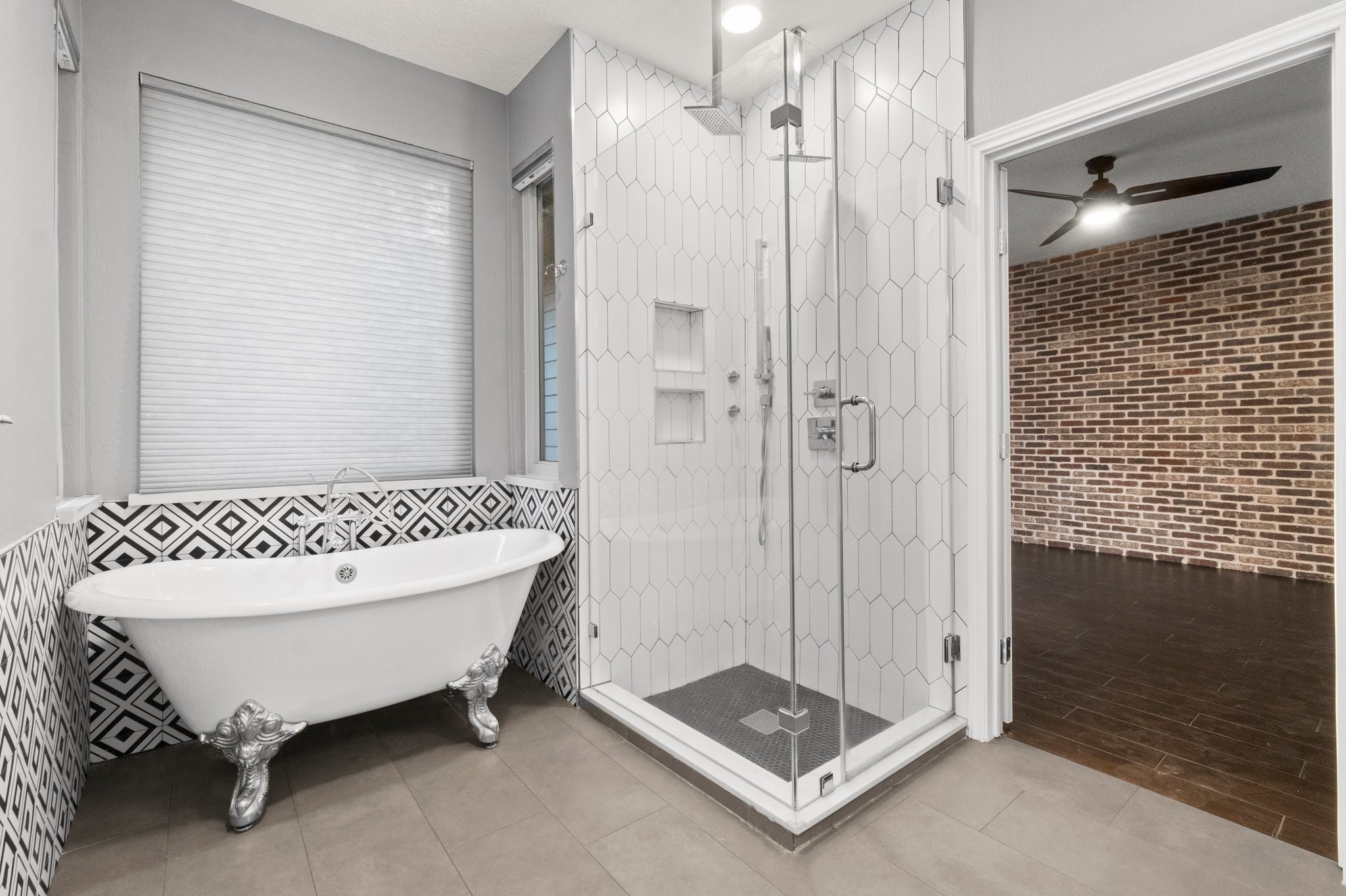 31 Tanager Trail The Woodlands, TX 77381 - Photo 29 of 48 a bathroom with a mirror and a shower