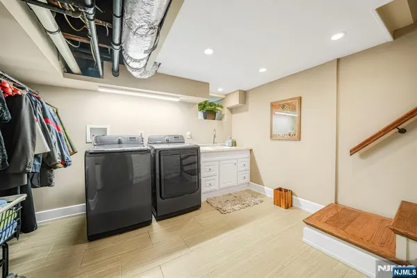a view of a storage & utility room with furniture