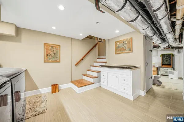 a bedroom with a bed and cabinets