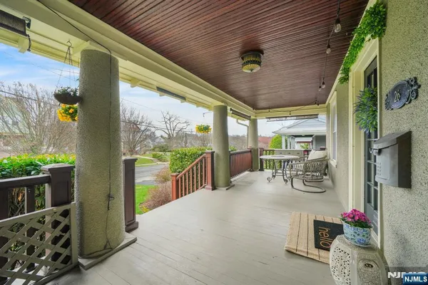 a view of a porch with furniture