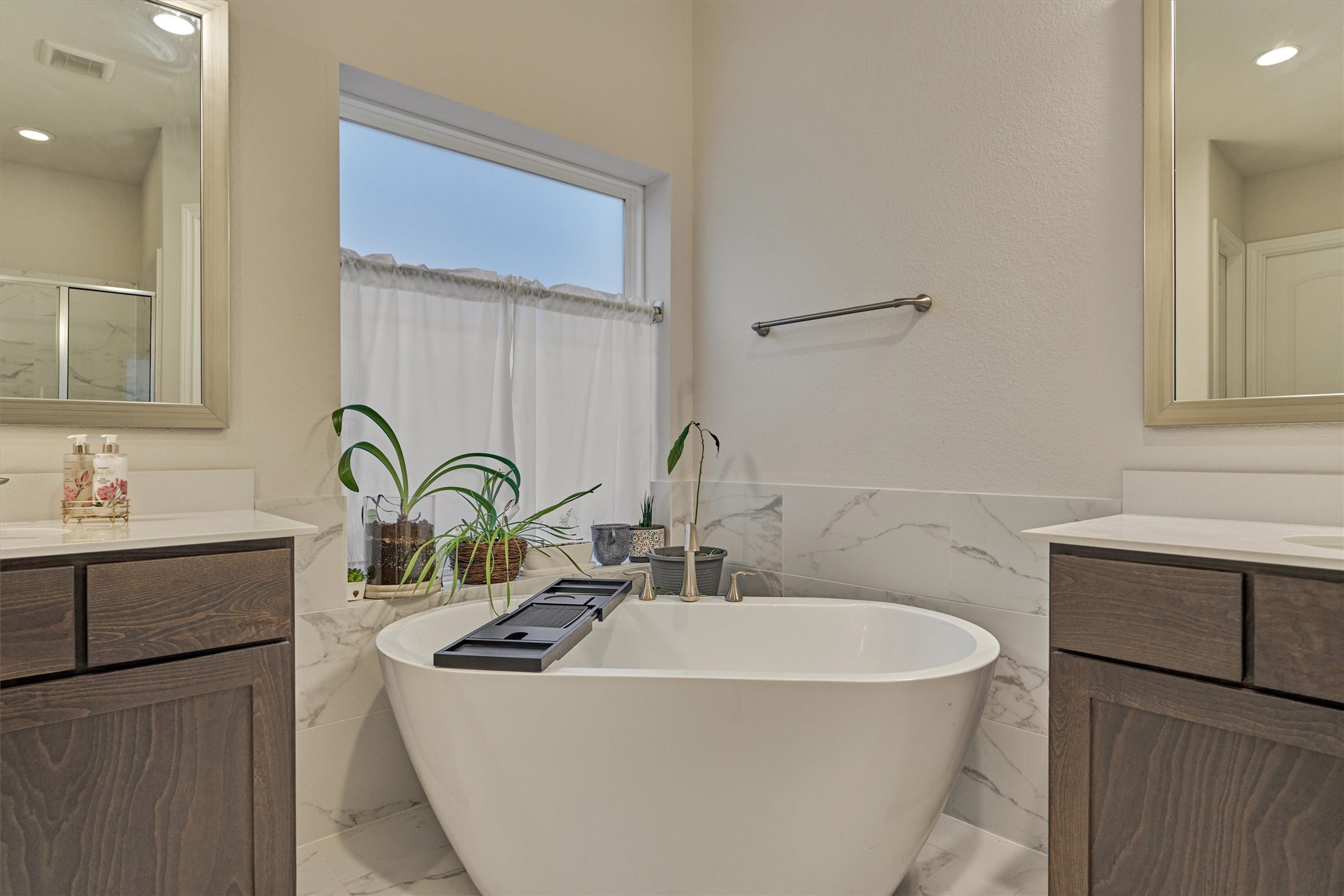 15230 Tree Swallow Court Magnolia, TX 77354 - Photo 26 of 49 a white bath tub sitting in a bathroom