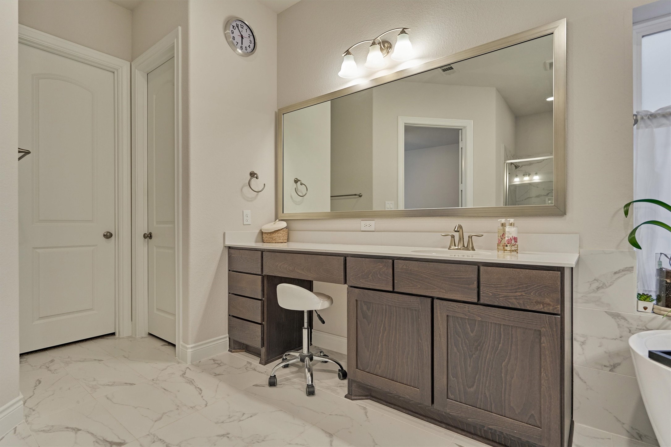 15230 Tree Swallow Court Magnolia, TX 77354 - Photo 28 of 49 a bathroom with a sink a toilet and a mirror